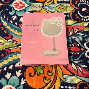 BNIB impressions Hello Kitty LED mirror